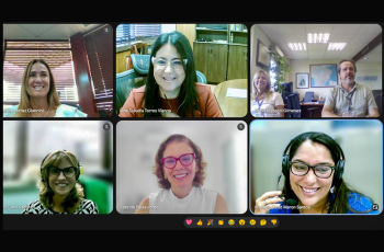 Captura de tela de uma reunião virtual com sete participantes em formato de grade